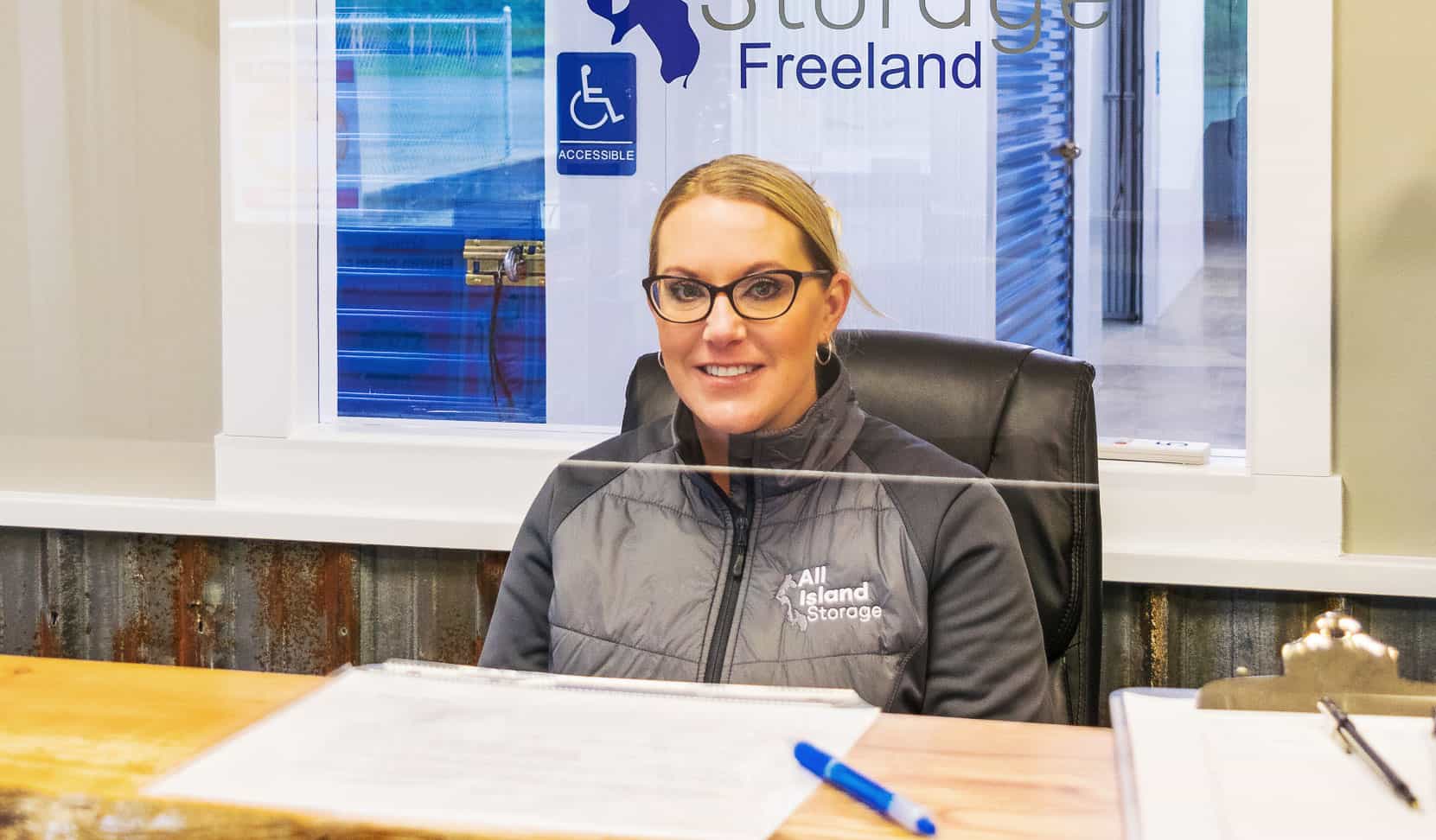 All Island Storage team member at the Freeland front desk